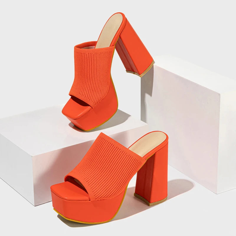 Neon stretch ribbed knit platform mule heel in bold color-forward hues with sky-high block sole