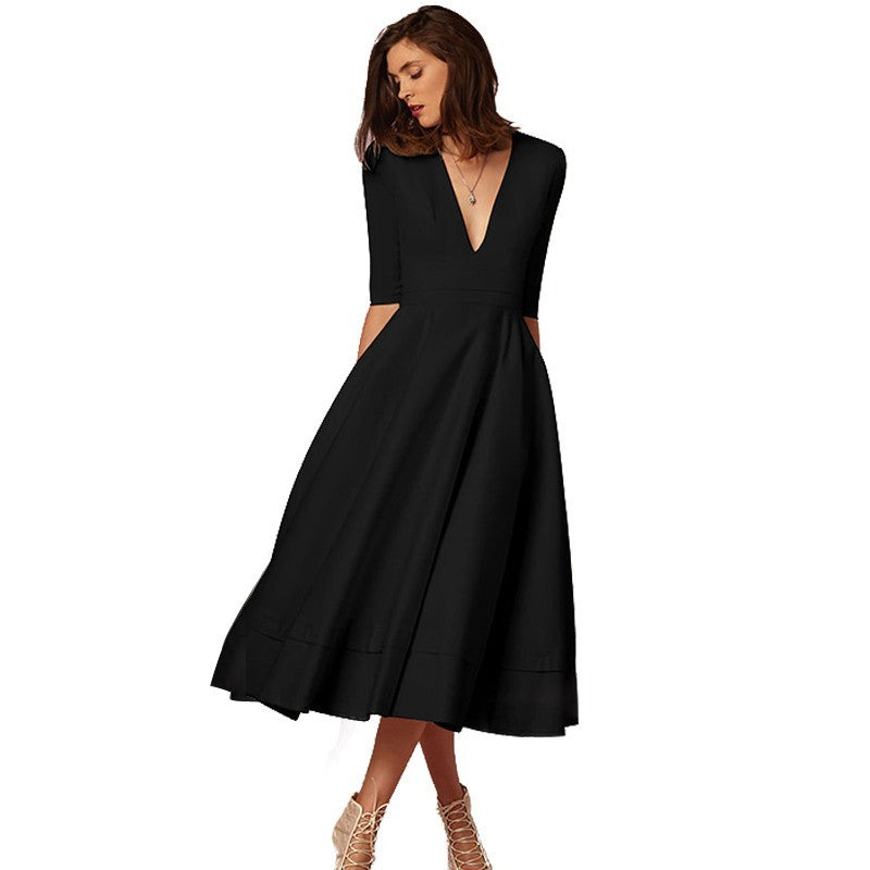 Retro 60s swing V-neck dress in vintage style with flattering fit and fluid silhouette