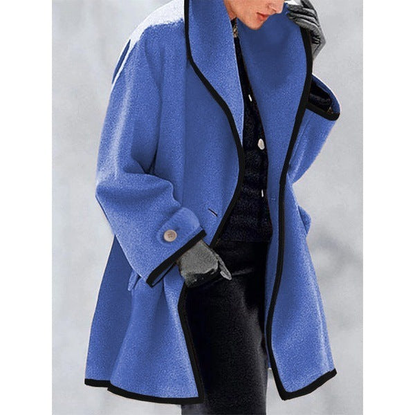 Women's loose fit elegant coat with contrast piping trim, wide collar, bold detailing, modern cut