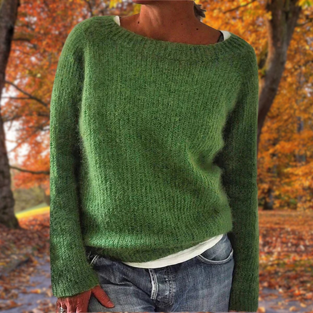Women's textured knit relaxed fit sweater in neutral tone, cozy layering style with soft tactile finish