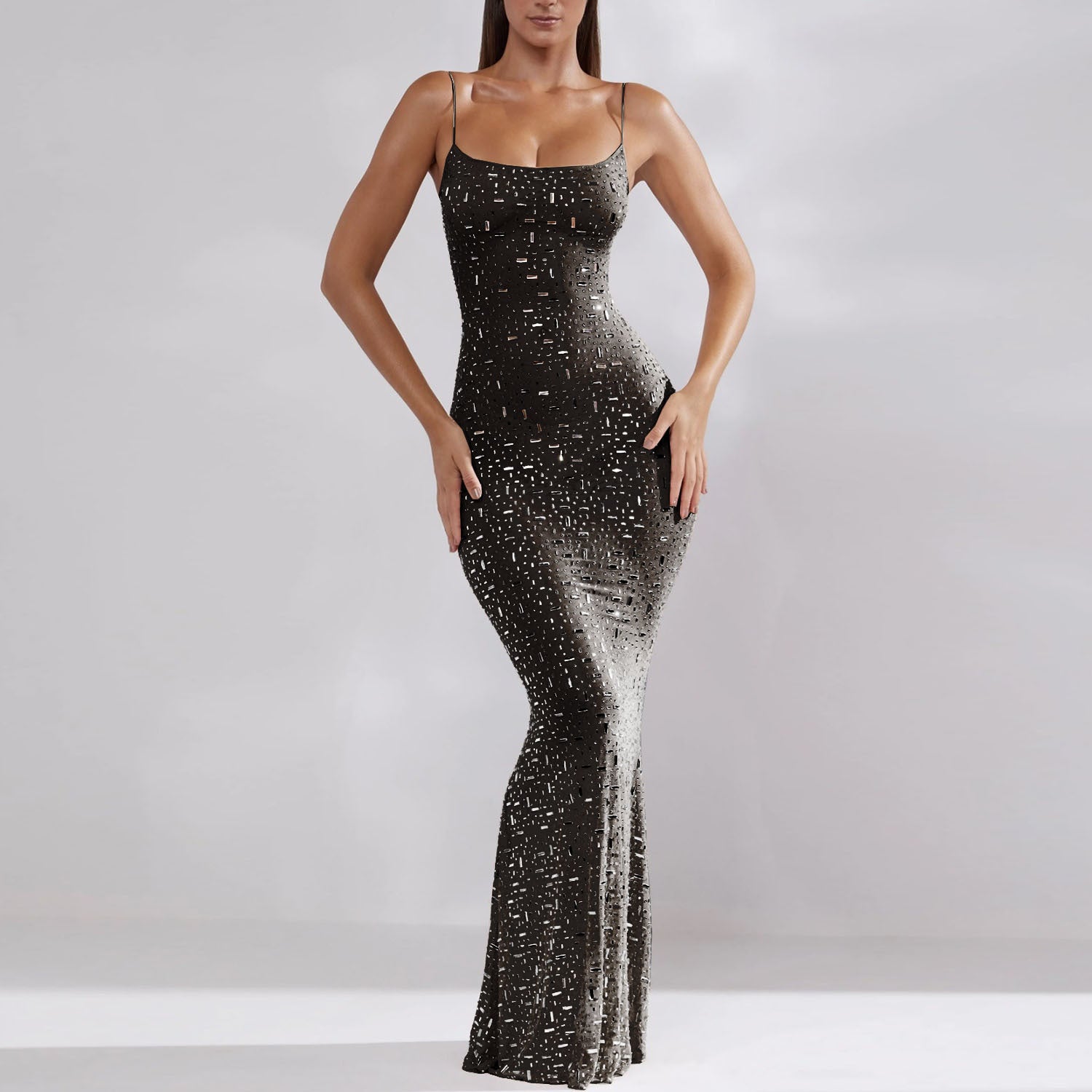 Elegant black mermaid dress with chic strap detailing, curve-hugging silhouette for evening events