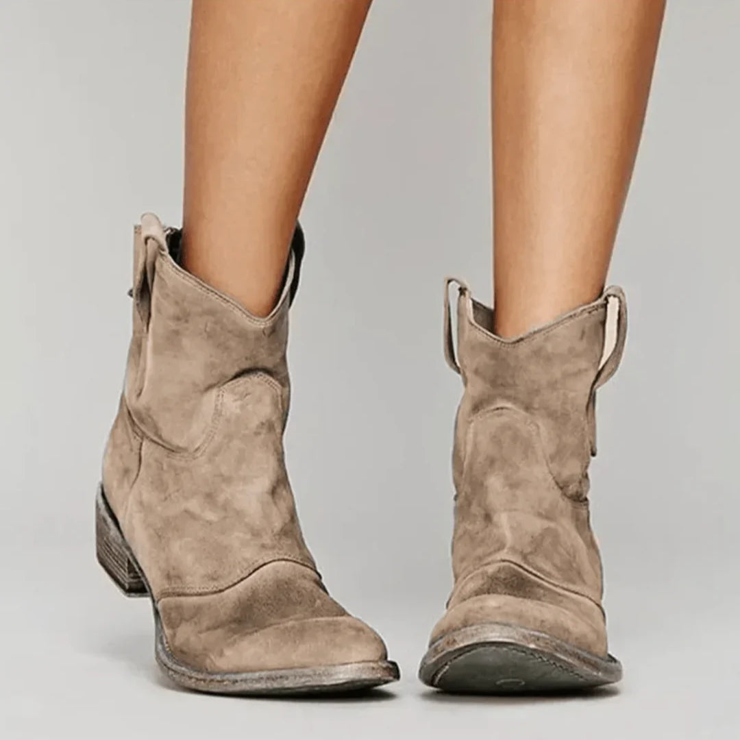 Women's brown suede western curve boots with low heel and sculpted silhouette for city style