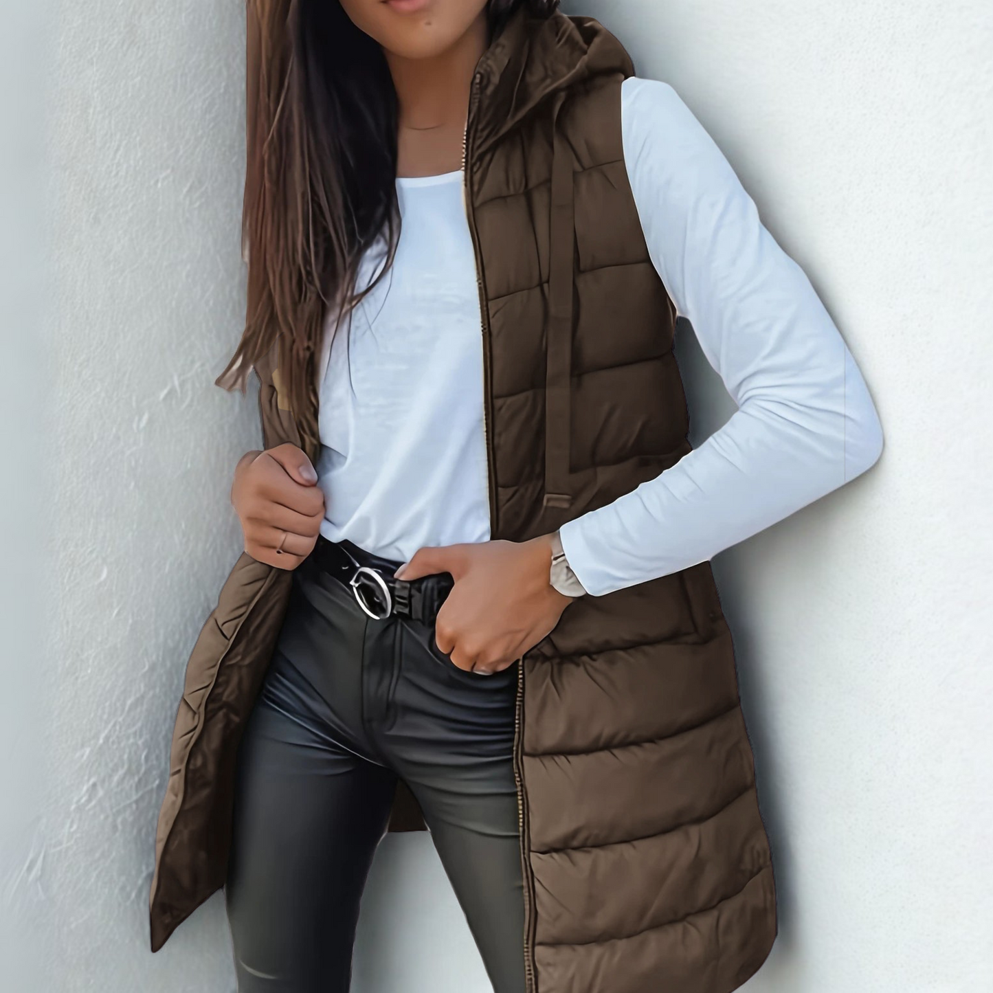 Women's long hooded puffer vest lightweight quilted longline silhouette sleeveless jacket