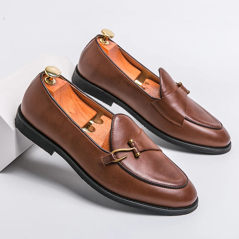 Men's black vegan leather bit loafer with bold modern horse-bit hardware and cushioned insole