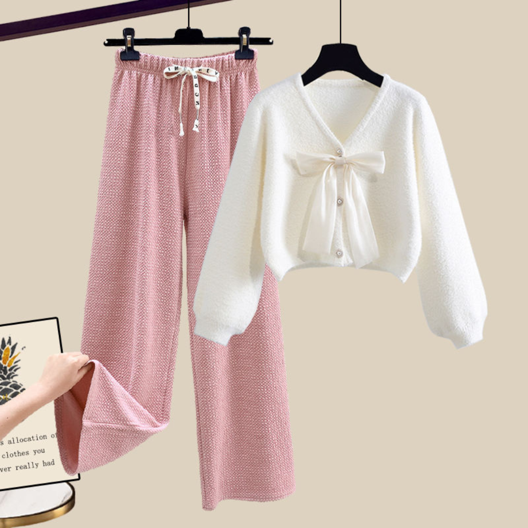 Women's plush knit cropped cardigan pants set in neutral tones with sheer bow detail