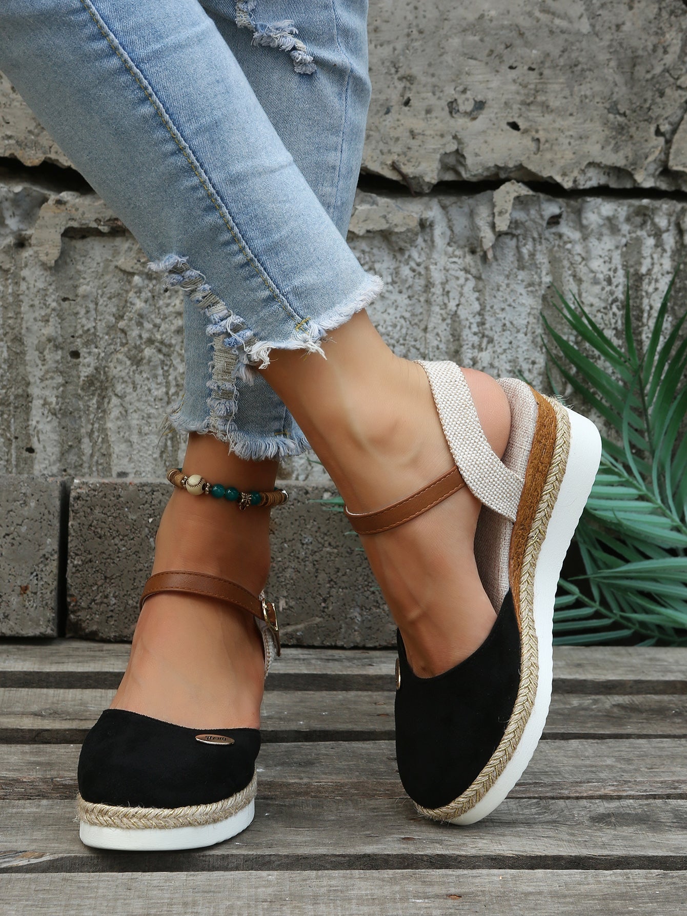 Women's closed-toe platform espadrilles with jute-wrapped midsole, adjustable ankle strap, low platform lift