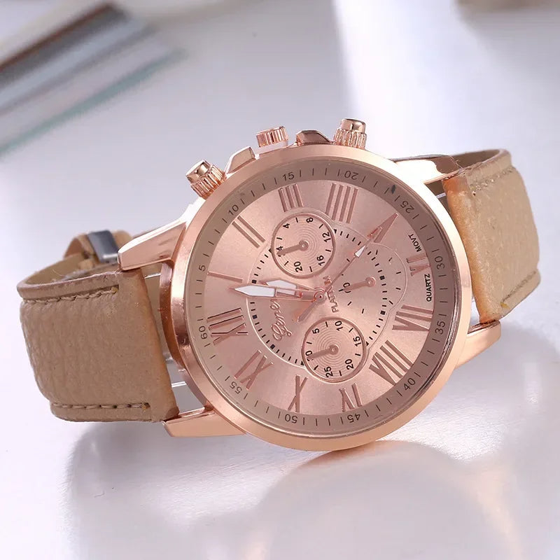 Geneva women's chronograph watch gold case vibrant color dial bold strap Roman numeral accents