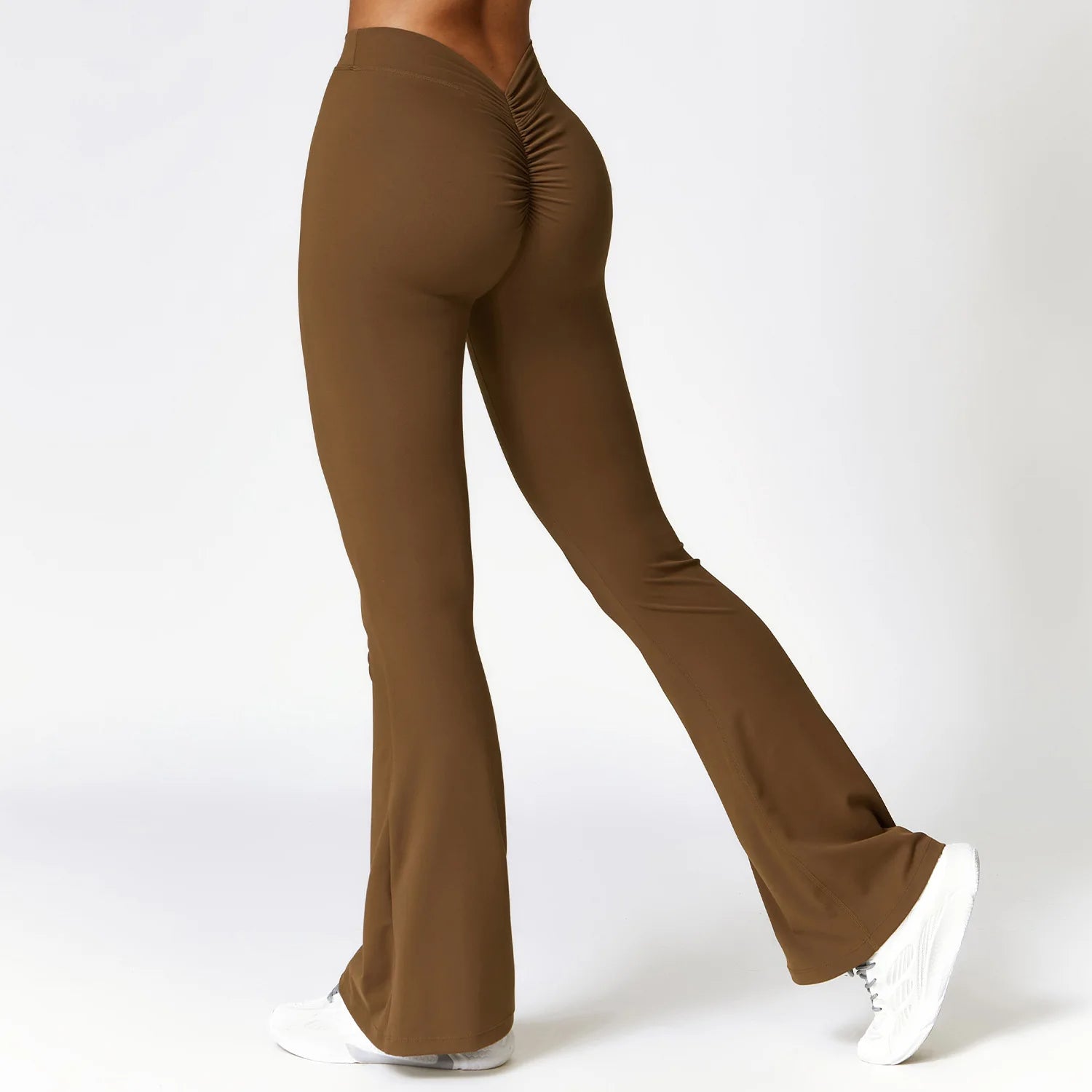 Black high-waisted flare yoga pants in premium nylon spandex with elastic waistband comfort fit