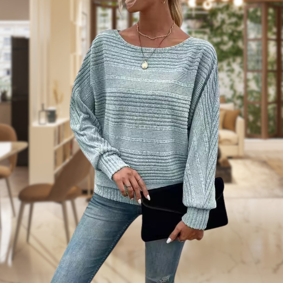 Women's cozy knit pullover sweater in warm tones, modern relaxed fit with soft wool fabric