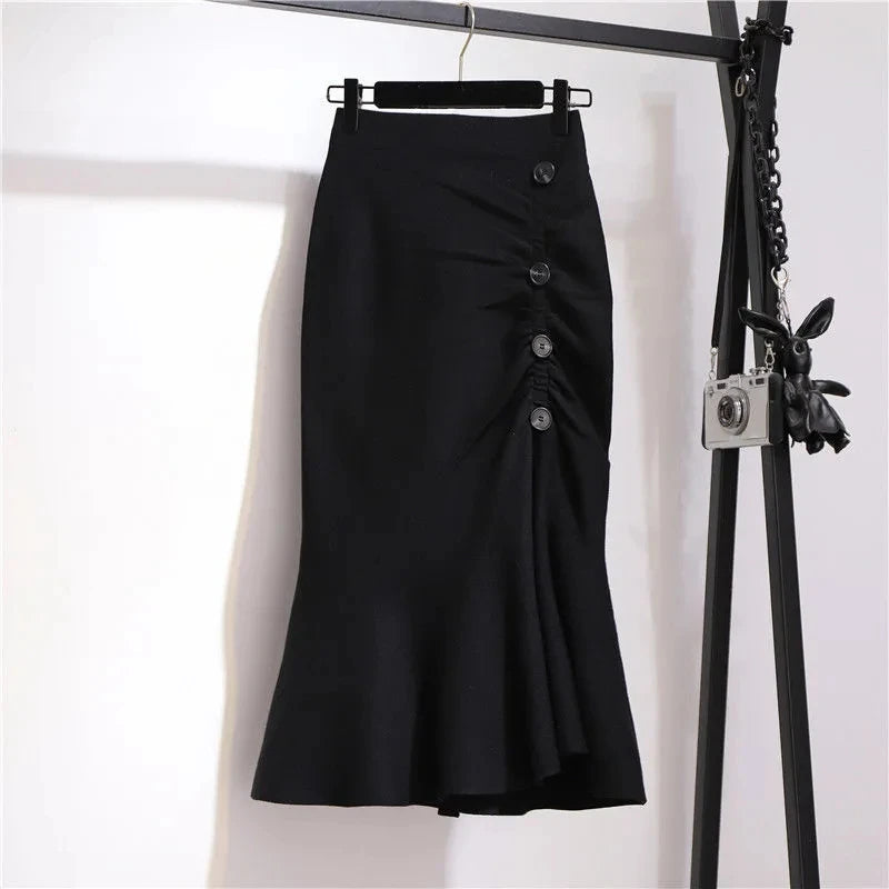 Black and white houndstooth trumpet skirt high-rise mid-length sculpted fit contour button details