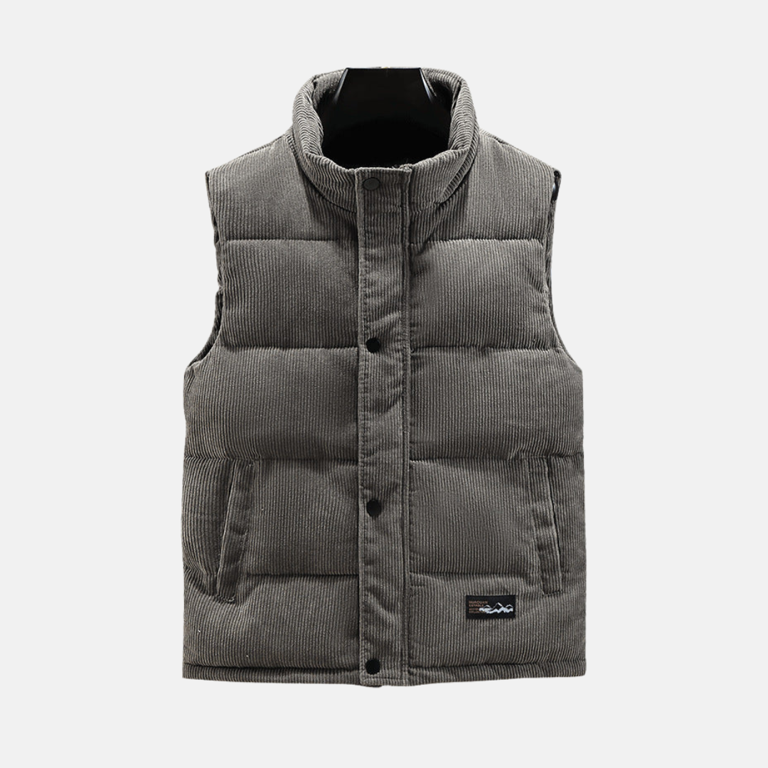 Men's brown corduroy quilted vest with high stand collar and snap-front closure for warm layering