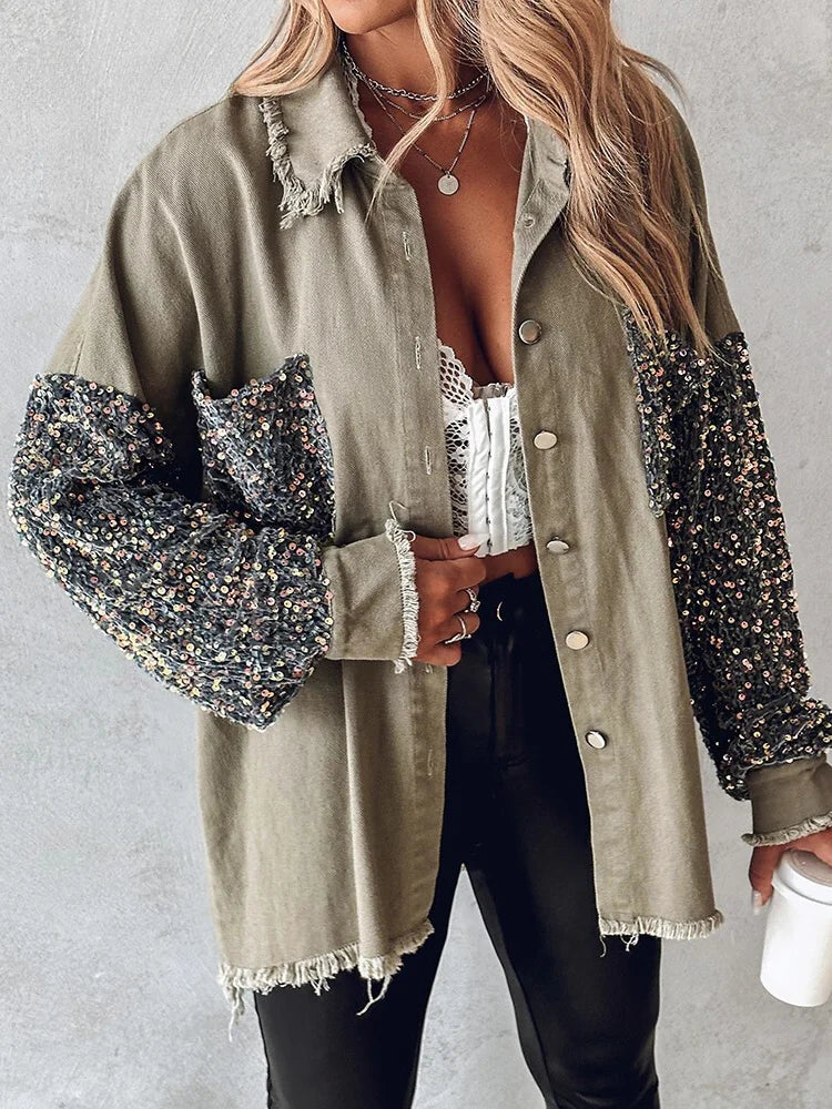 Women's blue sequined denim jacket with contrast sparkle detailing for street style