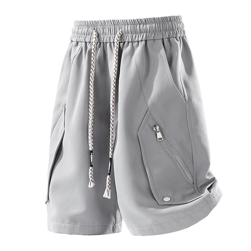 Unisex breathable performance athletic shorts with zip pockets and elastic waist for active lifestyles