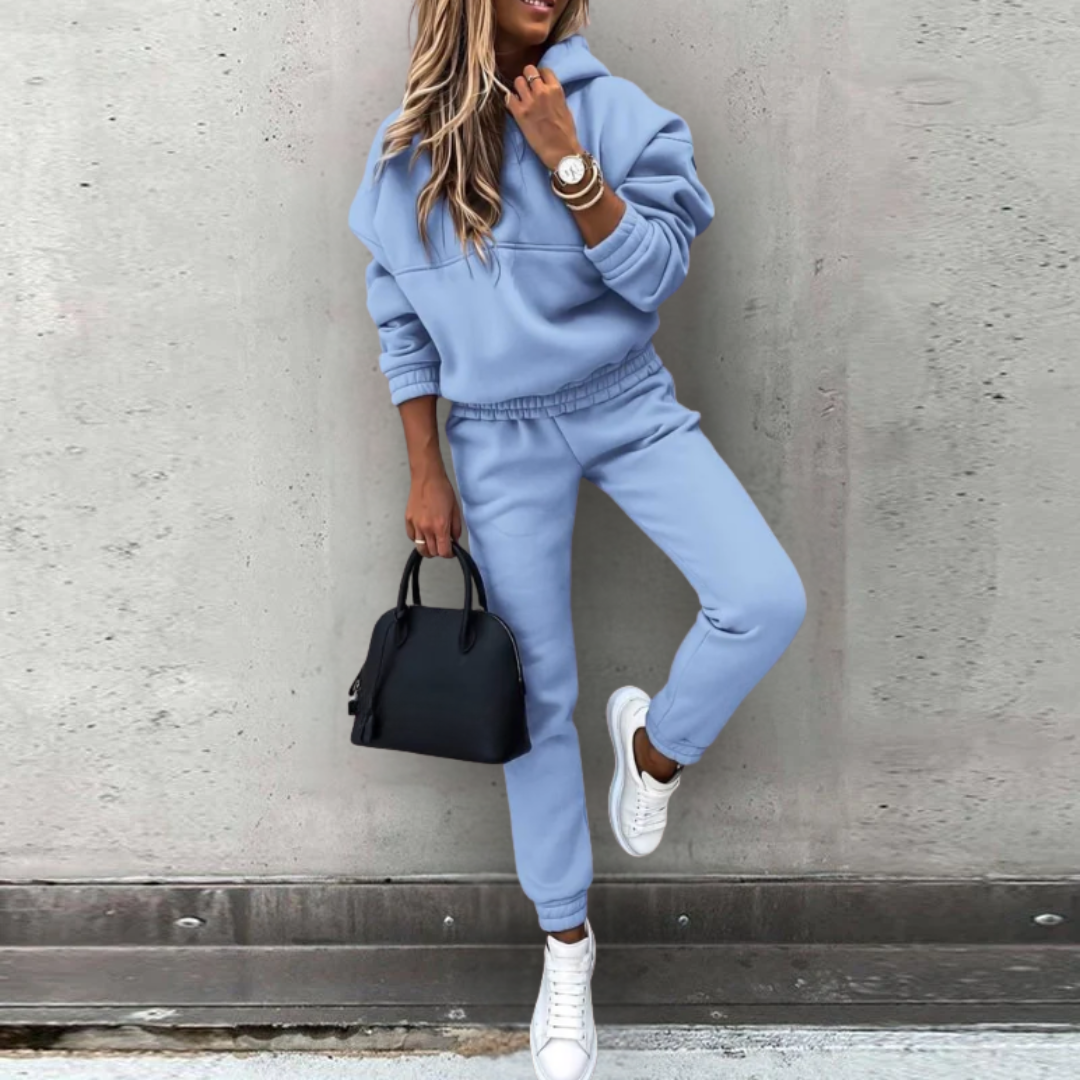 Women's stretch fit hoodie and joggers matching set in athleisure style with relaxed silhouette