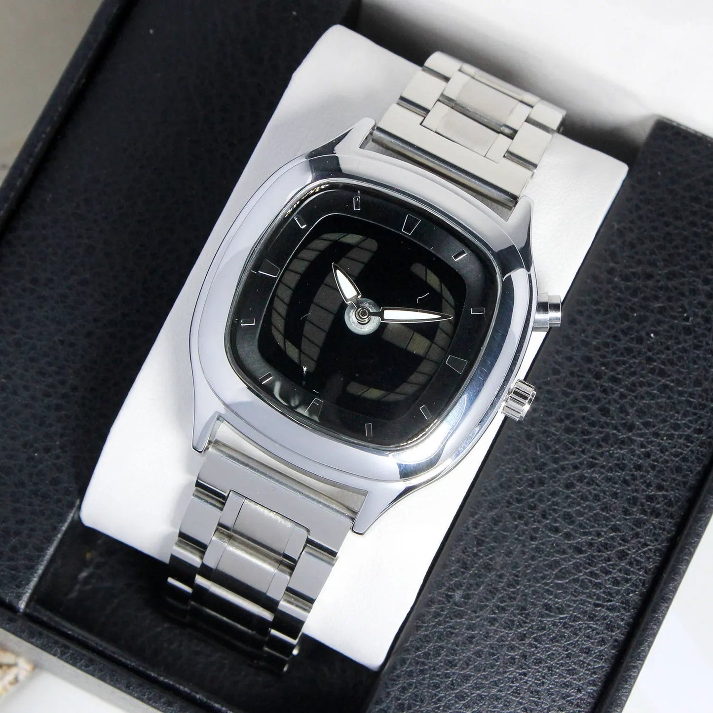Millennium Quadrant square-curved stainless steel watch light-reactive dial floating hour markers