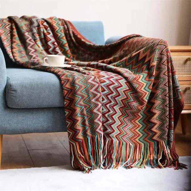 Boho stripe throw blanket with hand-knotted fringe, zigzag cotton knit weave in bold saturated tones