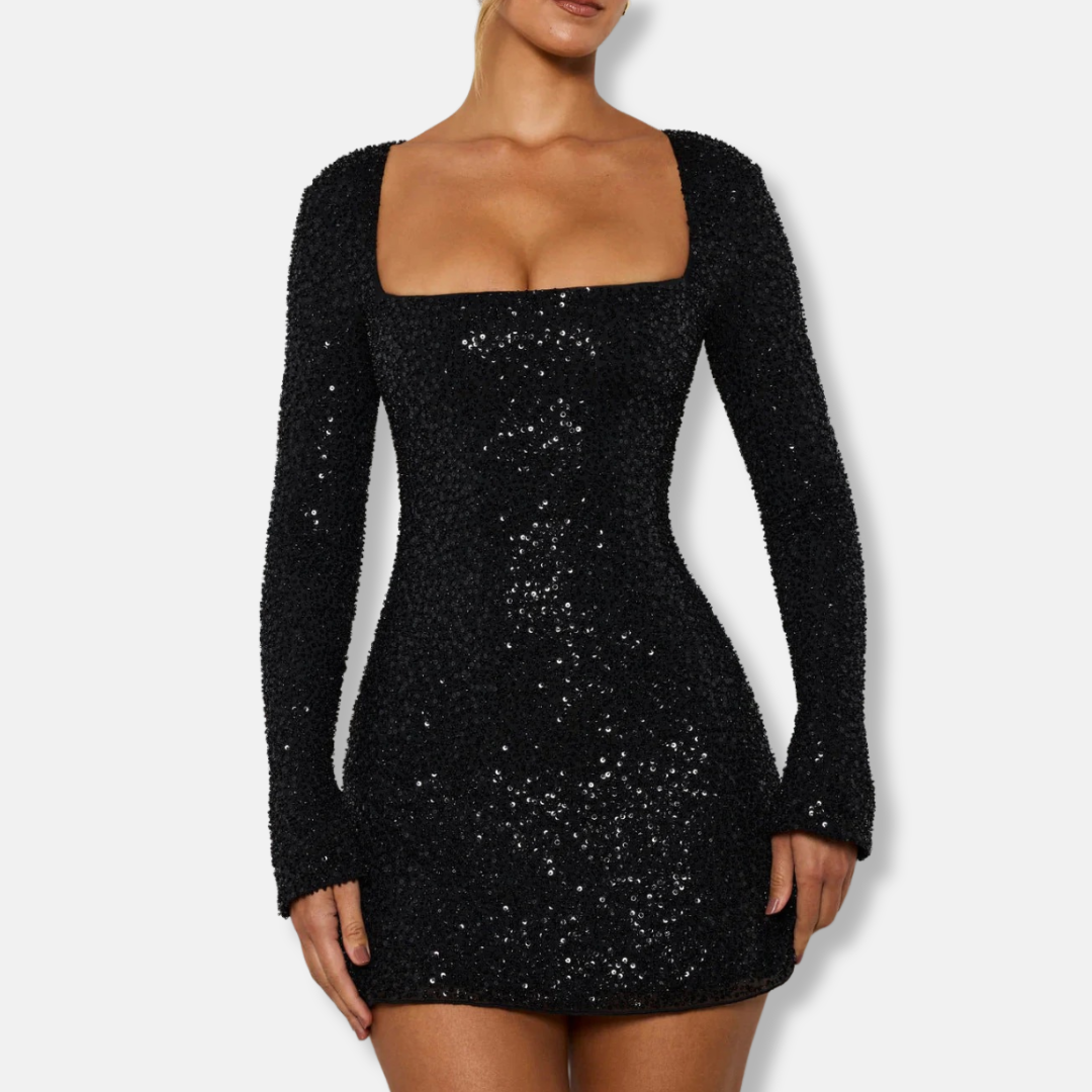 Silver sequin bodycon mini dress with square neck, long sleeves, and allover glam embellishments