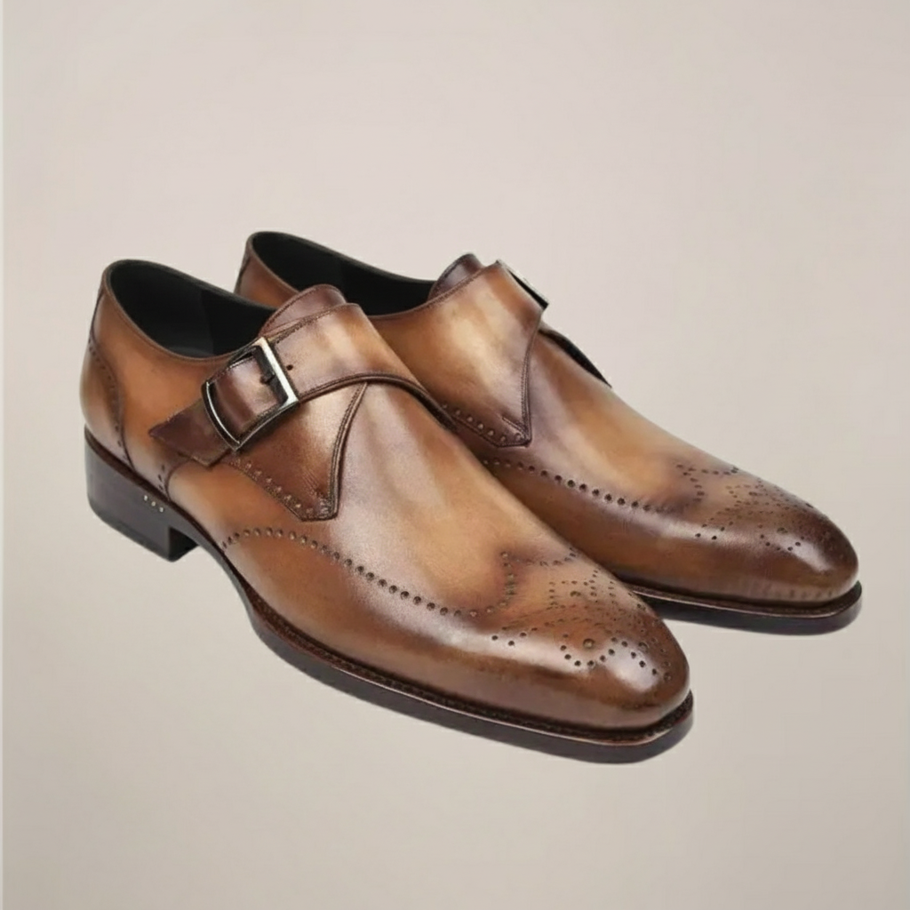 Men's rich brown monk strap dress shoes with single polished buckle and perforated toe detailing