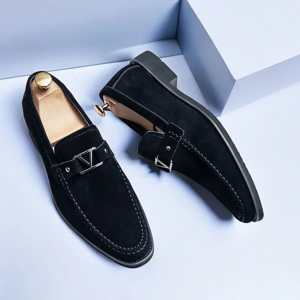 Men's black vegan suede slip-on loafer with decorative buckle and non-slip rubber sole