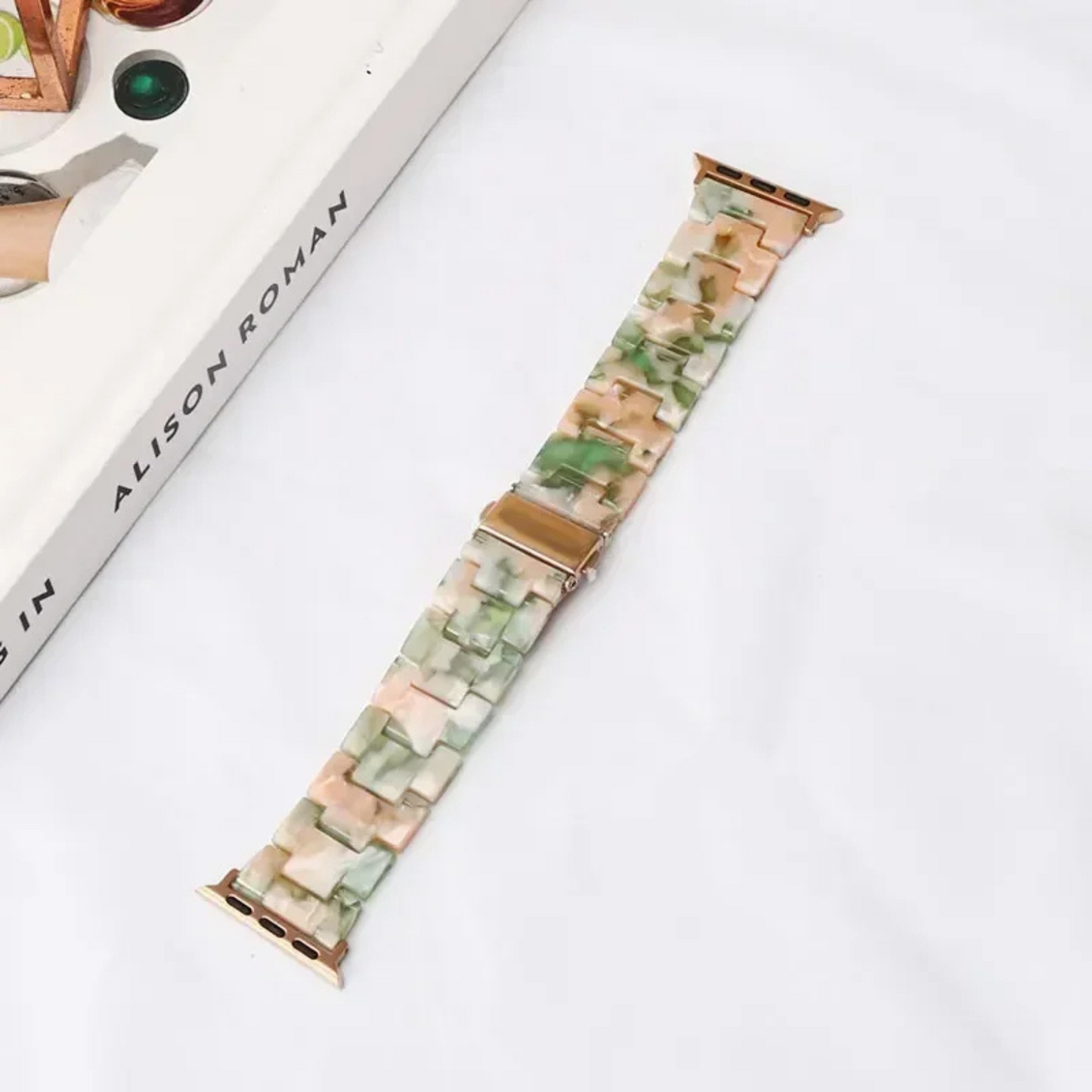 Bold marbled resin Apple Watch band with luminous high-gloss finish and scratch-resistant adjustable links
