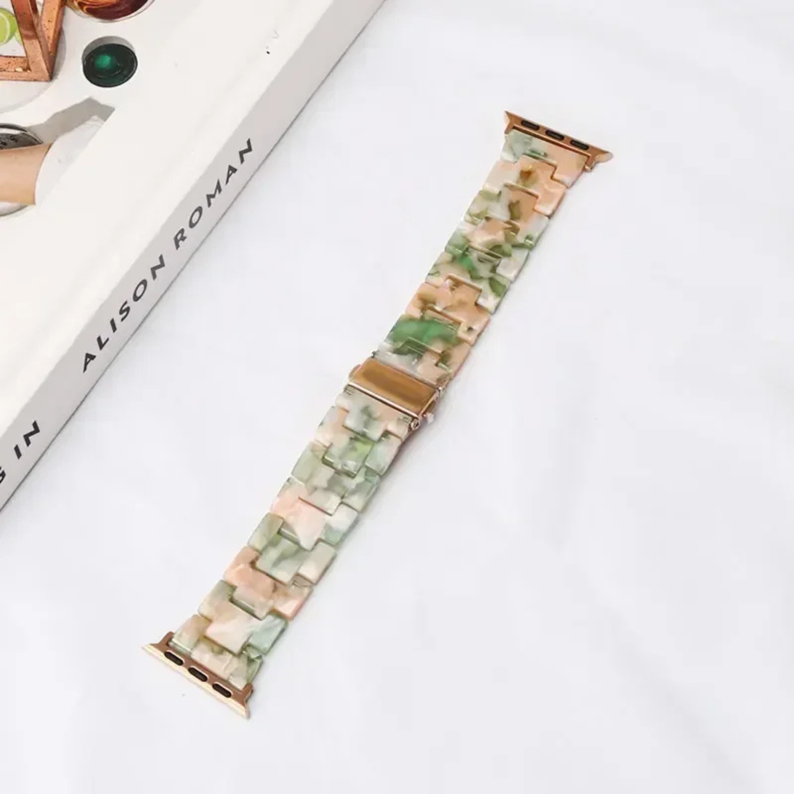 Bold marbled resin Apple Watch band with luminous high-gloss finish and scratch-resistant adjustable links
