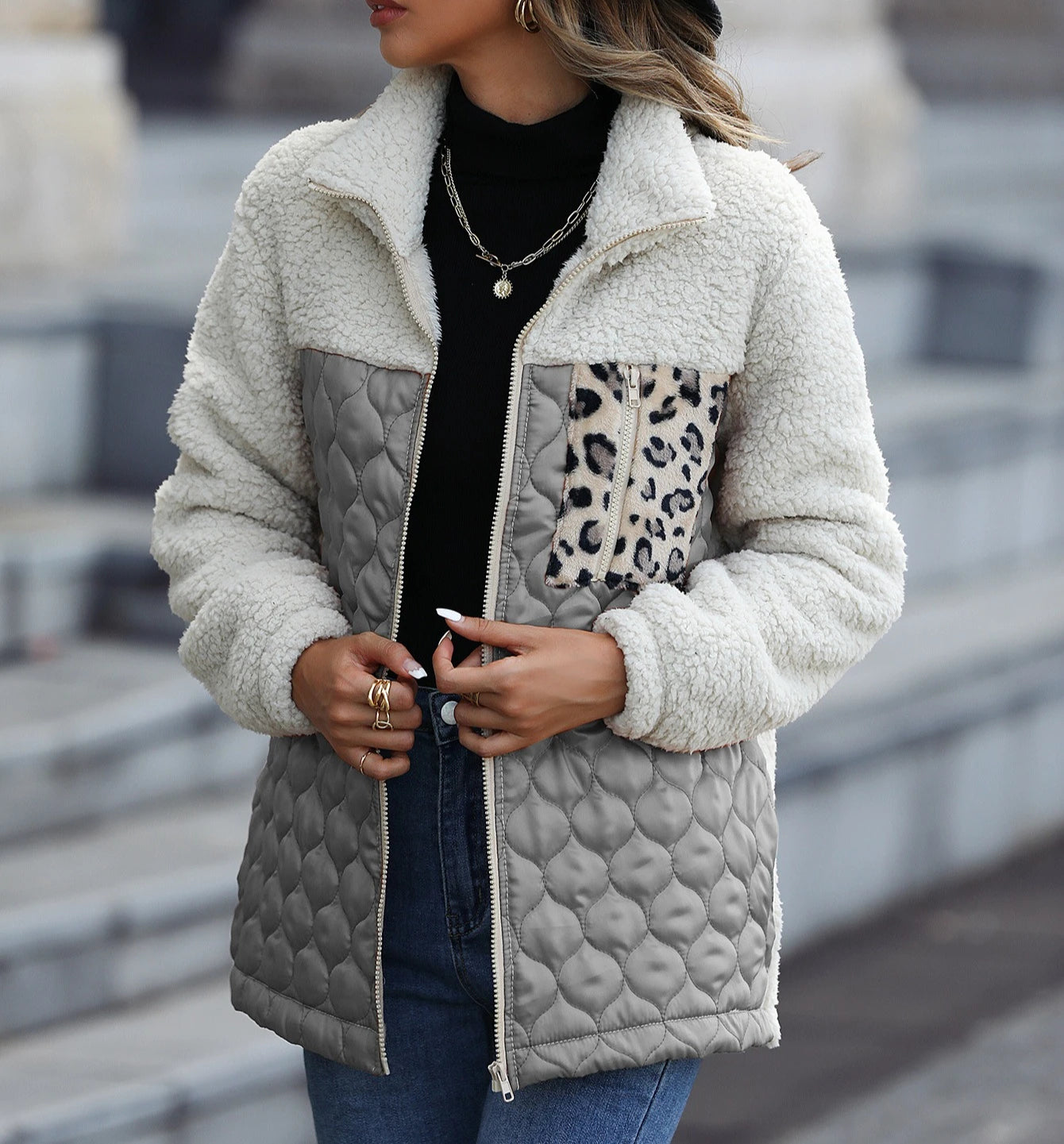 Women's black quilted sherpa jacket with leopard print zip pocket and satin panels stand collar