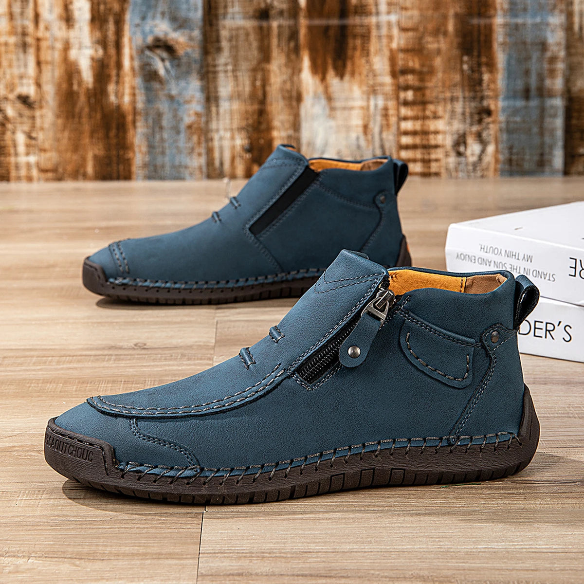 Women's vegan leather ankle boot with side zip, cushioned insole, and rugged textured outsole