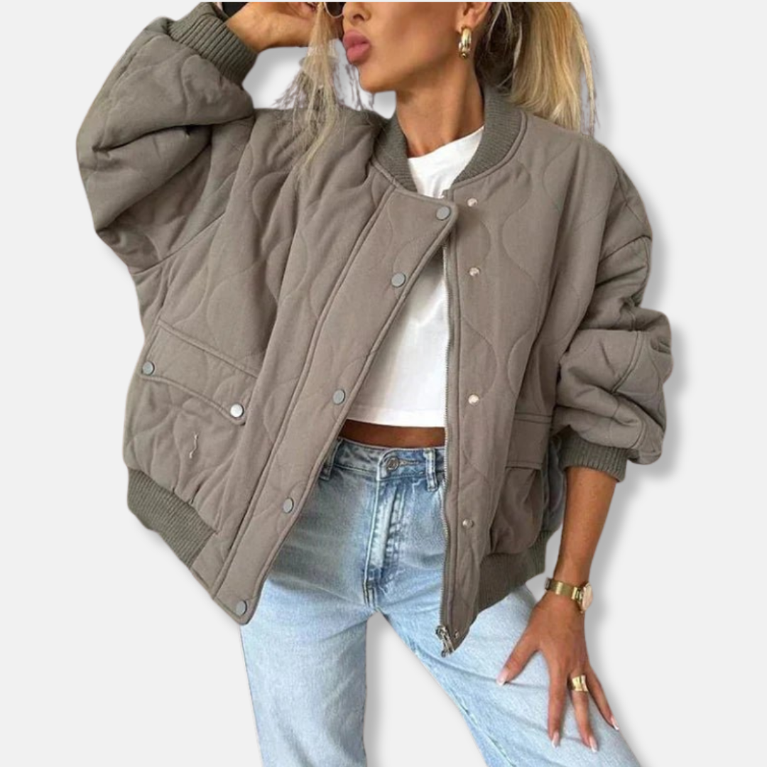 Women's oversized quilted bomber jacket lightweight snap button closure versatile transitional style