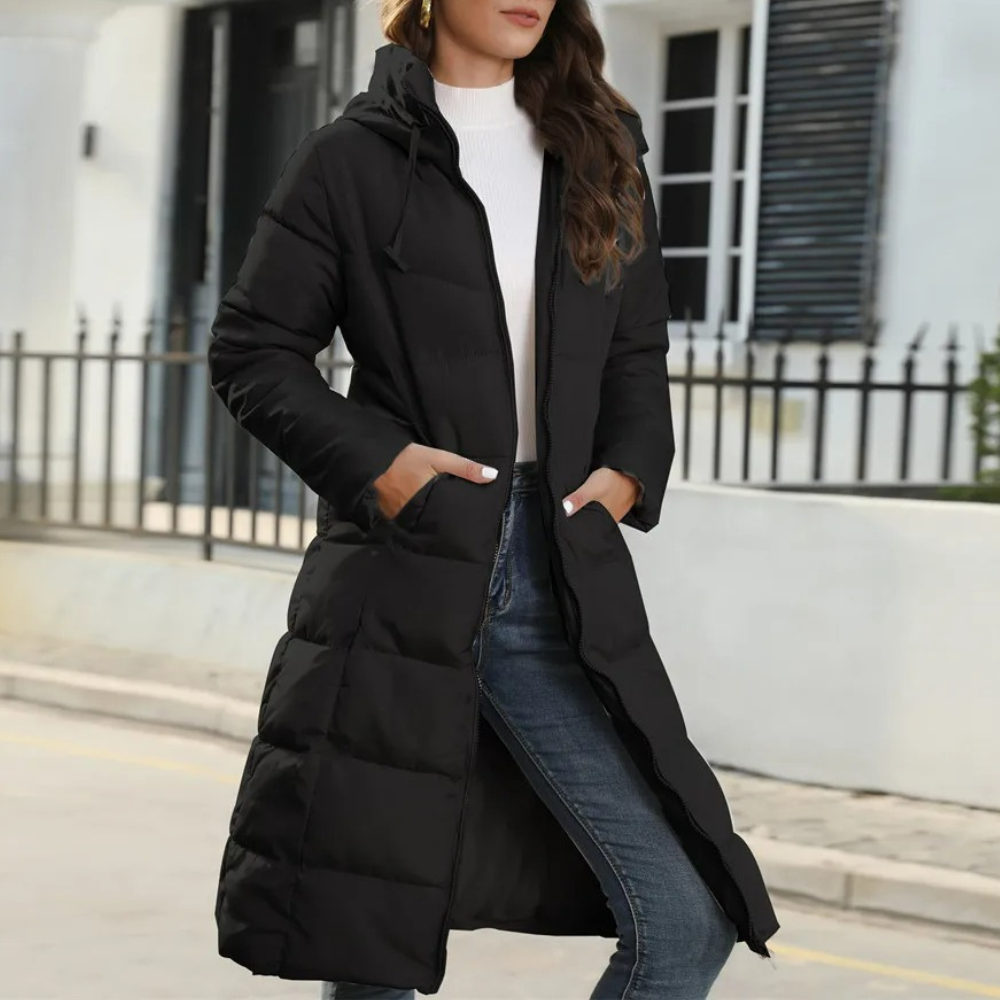 Women's long hooded puffer coat in modern city style with wind-resistant design for ultimate warmth