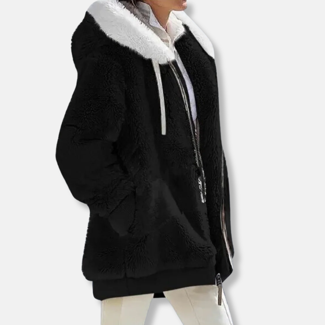 Women's oversized fleece hoodie jacket mid-thigh length with zip front and pockets, cozy winter layer