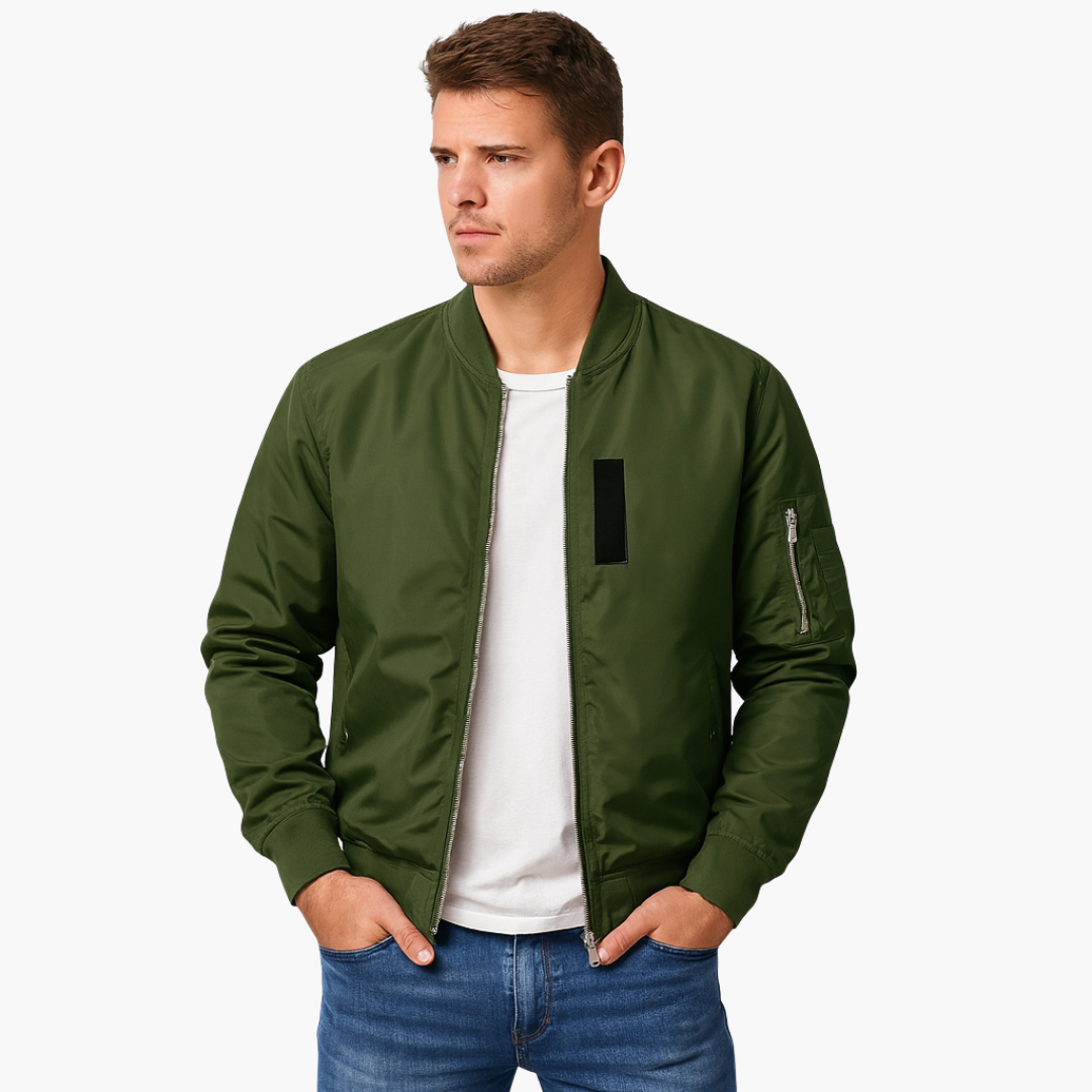 Men's black bomber jacket with ribbed neckline, piped waist pockets, and zip sleeve pocket