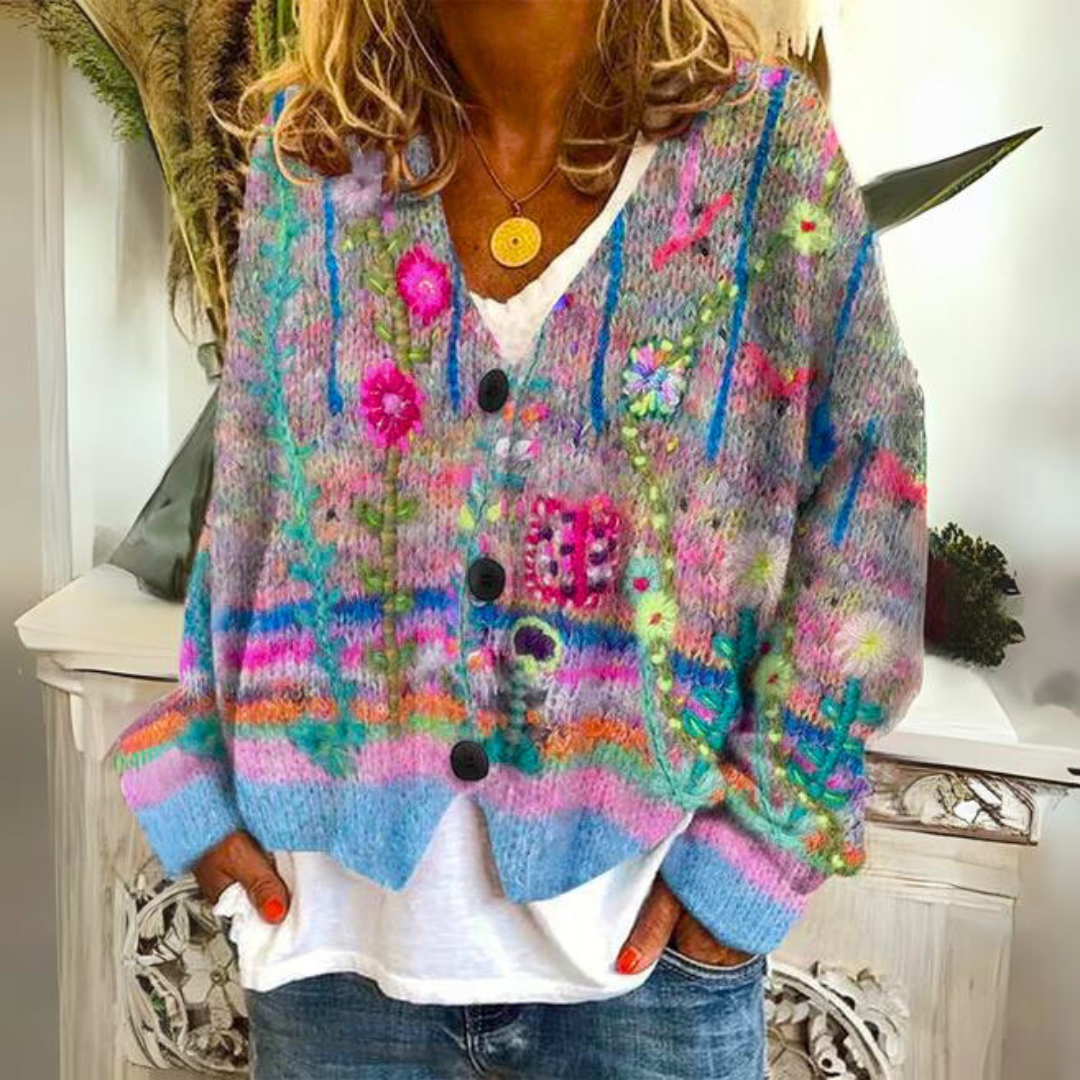 Women's multicolor floral knit button-up sweater with cozy layerable design and vibrant flower motifs