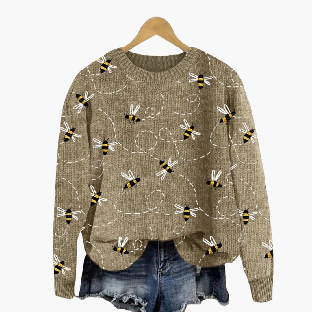 Neutral textured knit women's sweater with embroidered bee motifs, long sleeves, round neckline