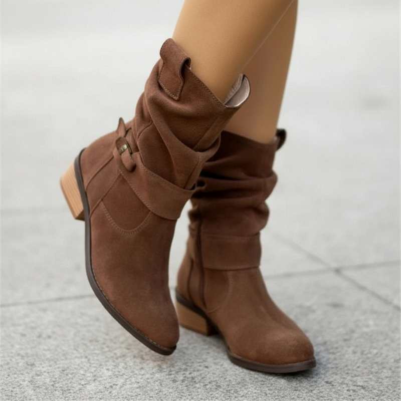 Women's black slouchy mid-calf boots with buckle strap accent and pointed toe for everyday wear
