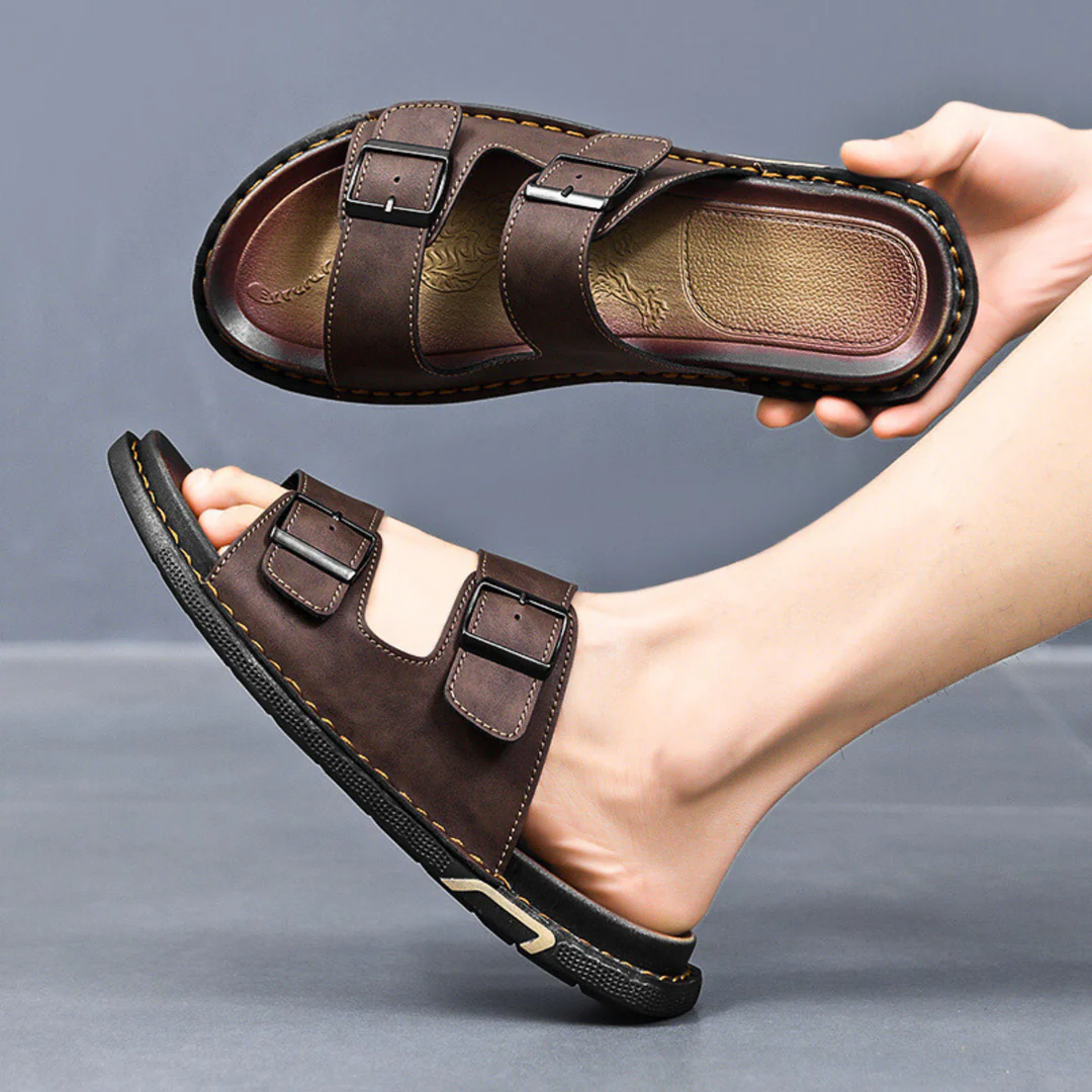 Tan leather double strap sandals with adjustable buckles, cushioned insole, and durable stitched sole