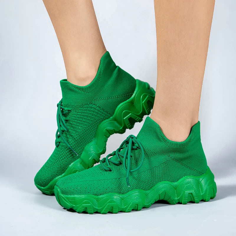 Xeon athletic sneaker with precision knit upper, wave outsole, breathable mesh, bold cushioned performance design