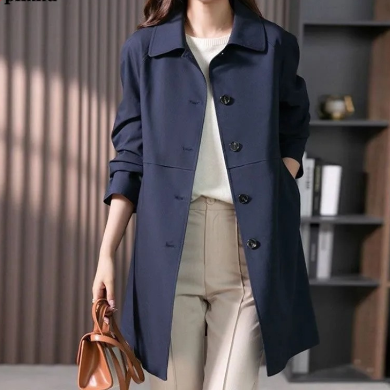 Women's classic beige trench coat structured silhouette double-breasted button-up lightweight winter outerwear