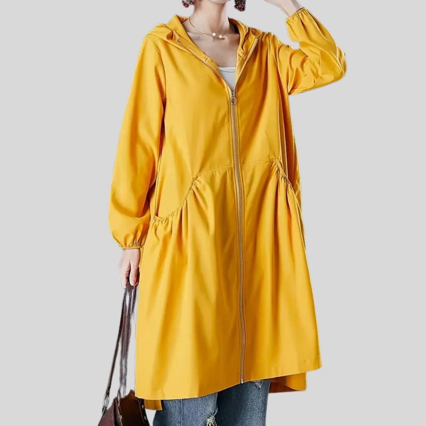 Women's waterproof long jacket mid-knee silhouette sealed seams all-weather insulated commuter coat