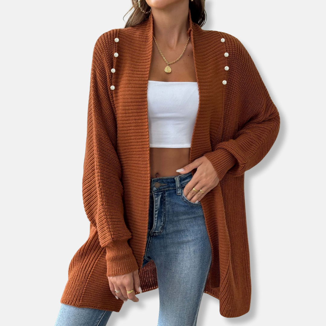 Women's longline acrylic knit cardigan with shawl collar and pearl button detailing, smart casual style