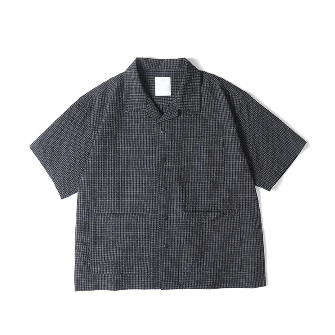 Deep violet cotton seersucker box fit shirt with three-pocket detail and coil grid texture for modern workwear