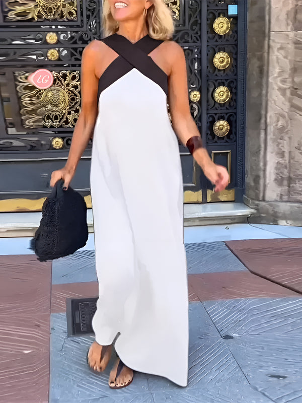 Black halter neck maxi dress with criss-cross neckline, lightweight fabric, effortless summer style