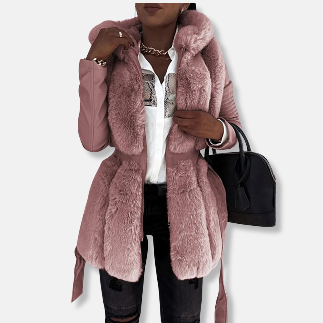 Women's black tailored faux leather jacket with faux fur collar, quilted sleeves, and belted waist