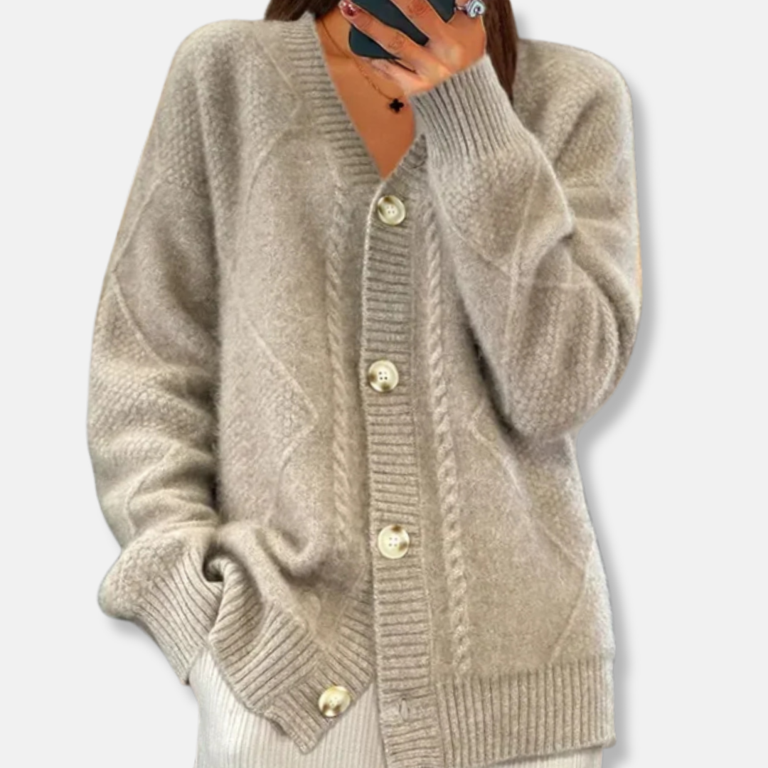 Women's cream cable knit relaxed fit cardigan with button front closure, hip length cozy everyday style