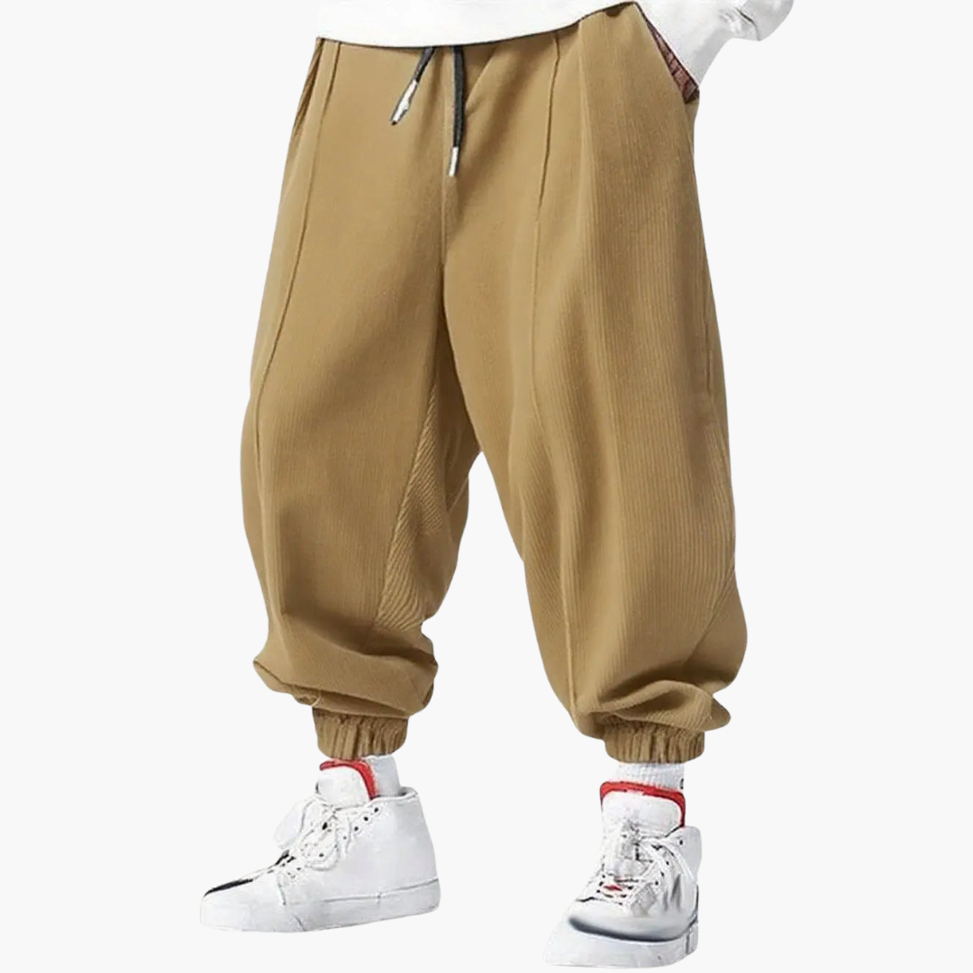 Men's brown corduroy straight-leg pants with elastic drawstring waistband and cuffed hem