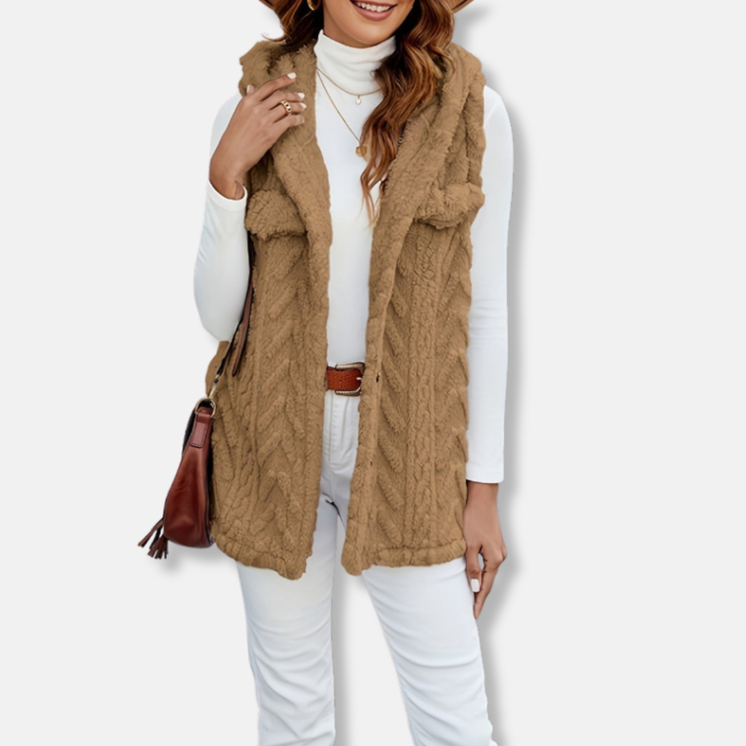 Women's cream cable knit hooded vest with plush fuzzy texture, relaxed fit, and front pockets