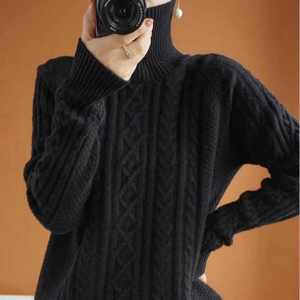 Women's loose-fit turtleneck sweater in premium soft knit with elegant classic silhouette