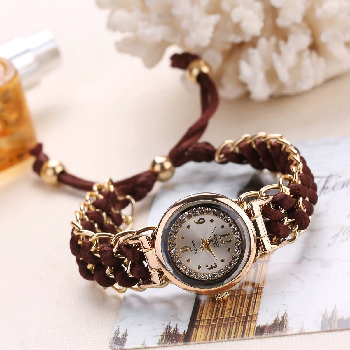 Athena women's quartz watch crystal-studded dial gold-tone bezel braided cord band everyday elegance
