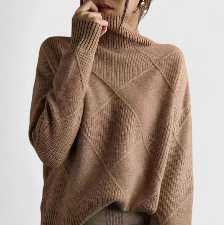 Women's slouchy high-neck winter sweater with softly draped silhouette for a cozy polished look