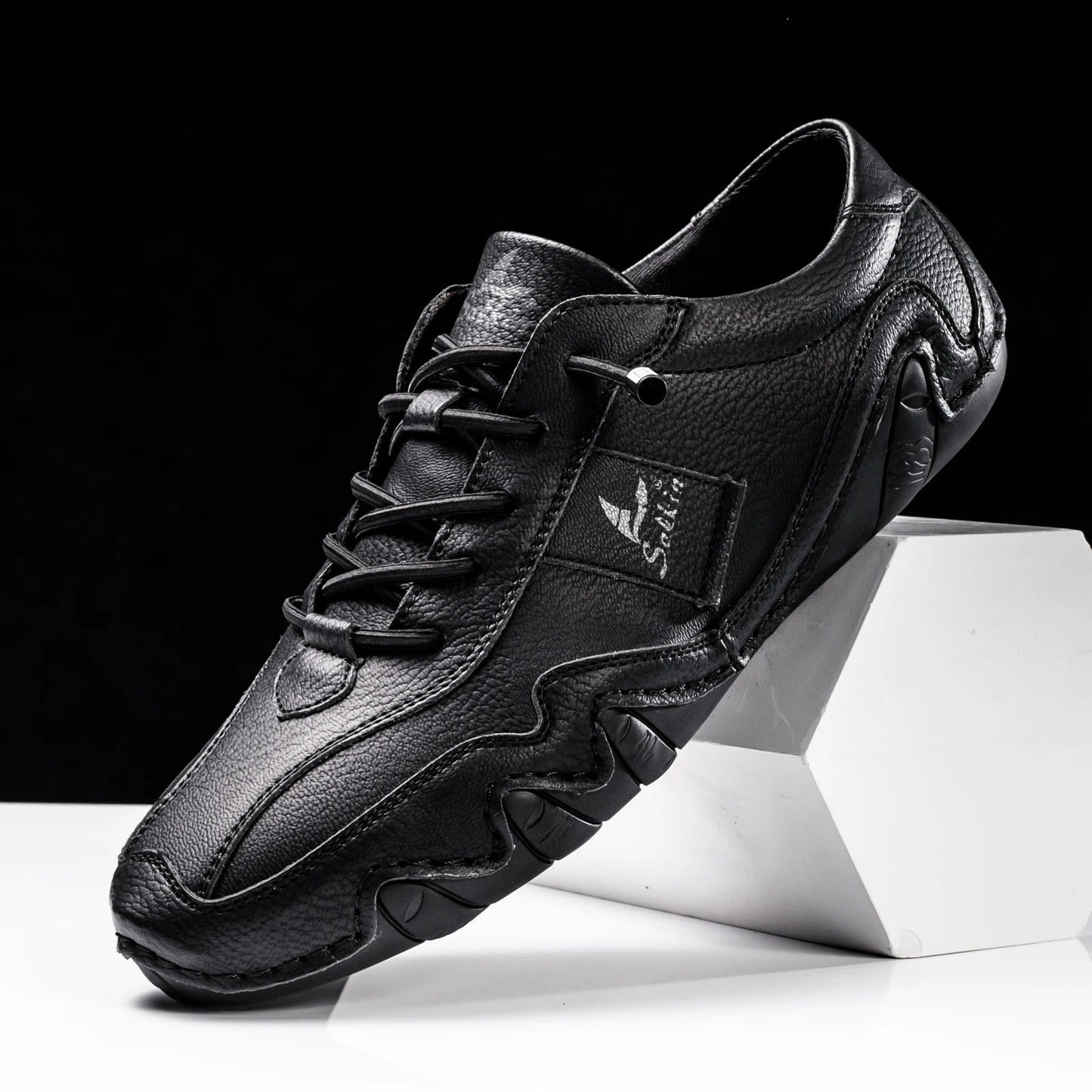 Casual lace-up shoes with smooth panels, low-cut silhouette, and flexible soles for all-day comfort