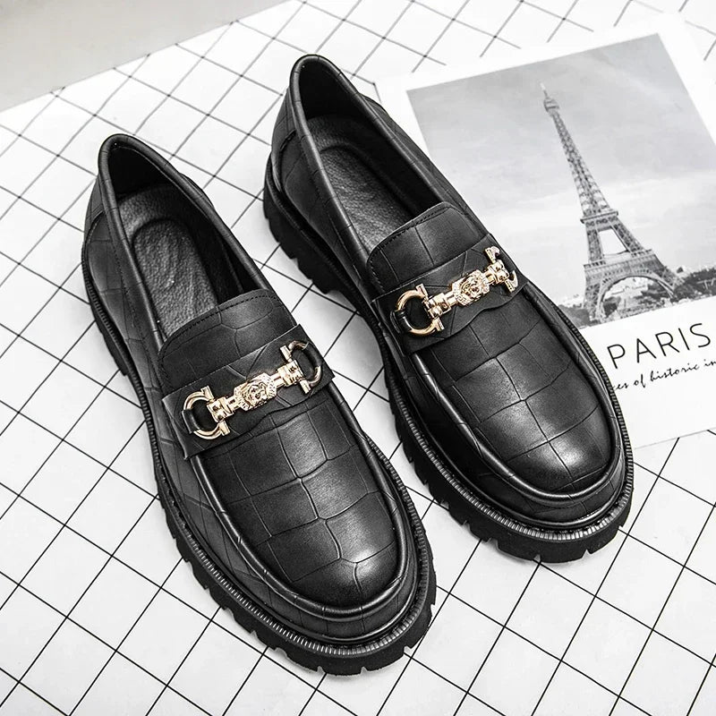 Men's black patent leather loafer with croc-texture panels, gold chain hardware, and chunky lug sole